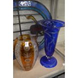 Two large cut glass vases.