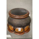 An early 20th century elephant foot mounted box with bi-fold hinged lid.
