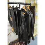 A quantity of ladies' black leather jackets and skirts etc.
