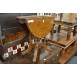 A Victorian walnut small drop leaf table.