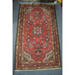 A small Persian rug.