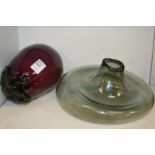 An unusual glass model of an aubergine and a misshapen glass vase.
