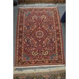 A small Persian rug.