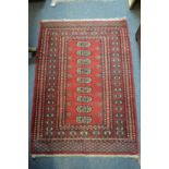 A small Bokhara rug.