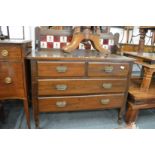 A stained pine chest with tiled splash back.