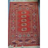 A small Bokhara rug.