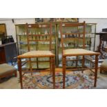 A pair of satinwood and inlaid occasional chairs.