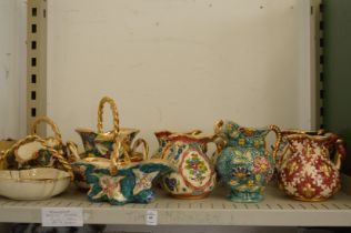 A quantity of decorative 1950's Belgian pottery jugs and flower baskets.