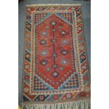 A small Persian rug.