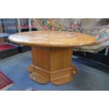 An unusual inlaid circular nautical themed coffee table.