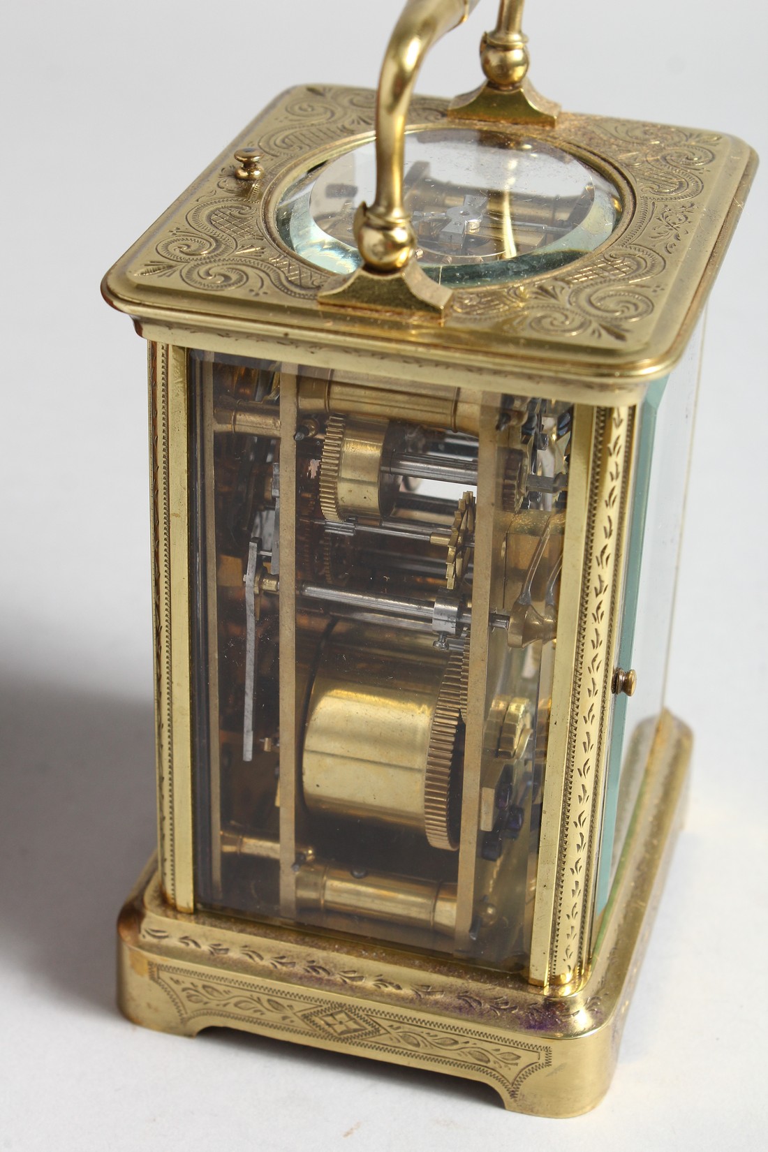 A GOOD FRENCH ENGRAVED BRASS CARRIAGE CLOCK with eight day movement, striking on a gong, enamel dial - Image 3 of 8