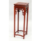 A 20TH CENTURY CHINESE REDWOOD SQUARE SHAPED TALL STAND. 1ft wide x 3ft high.