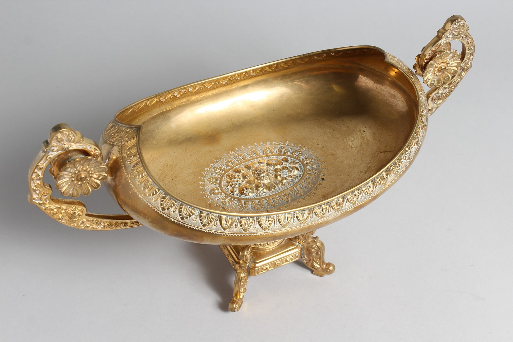 A DECORATIVE CLASSICAL STYLE GILT BRONZE TWIN HANDLED PEDESTAL OVAL SHAPE BOWL. 15.5ins high. - Image 3 of 4