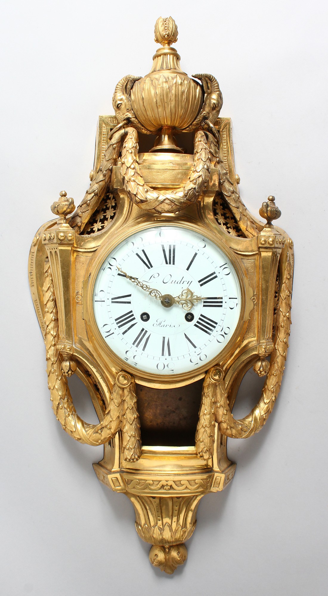 A 19TH CENTURY FRENCH ORMOLU CARTEL CLOCK with eight day movement, enameled dial with Roman numerals