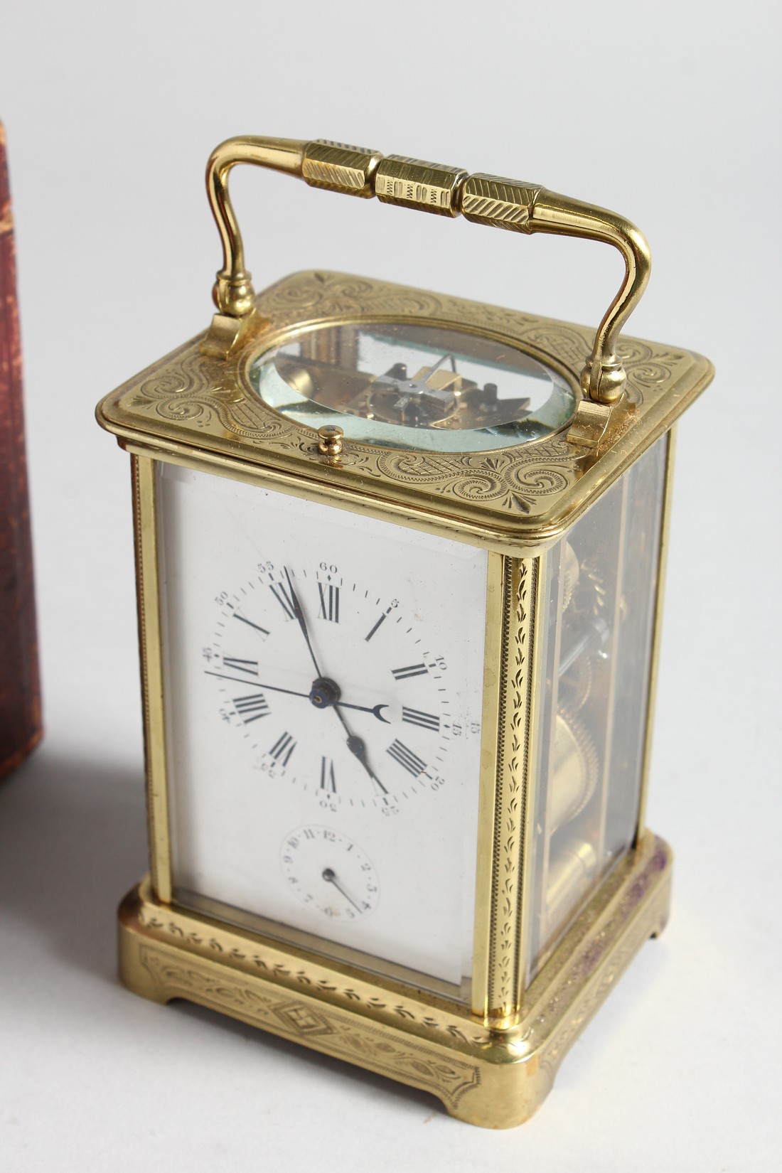 A GOOD FRENCH ENGRAVED BRASS CARRIAGE CLOCK with eight day movement, striking on a gong, enamel dial - Image 2 of 8
