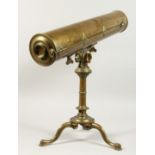 AN 18TH CENTURY REFLECTIVE BRASS TELESCOPE on a tripod stand.