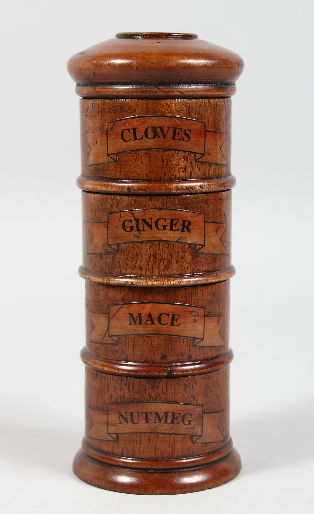 A FOUR SECTION WOODEN SPICE TOWER 7ins