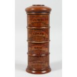 A FOUR SECTION WOODEN SPICE TOWER 7ins