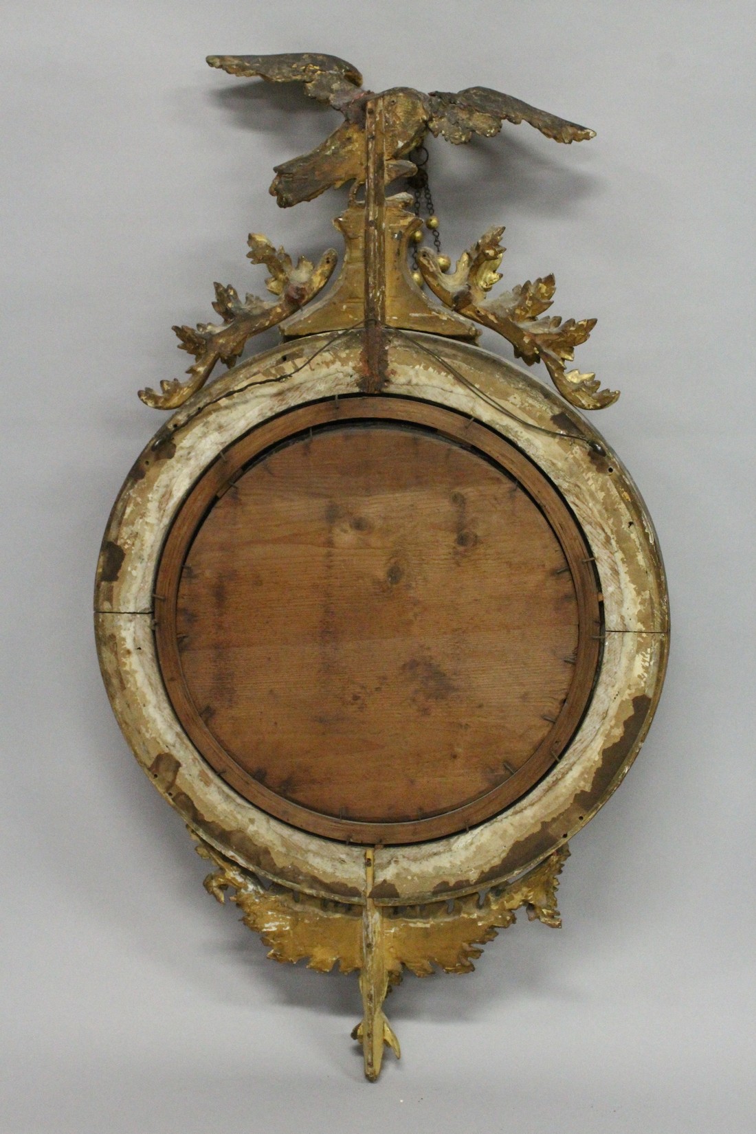 A REGENCY GILT WOOD CONVEX MIRROR with eagle cresting, ball applied frame and curved decoration to - Image 4 of 4