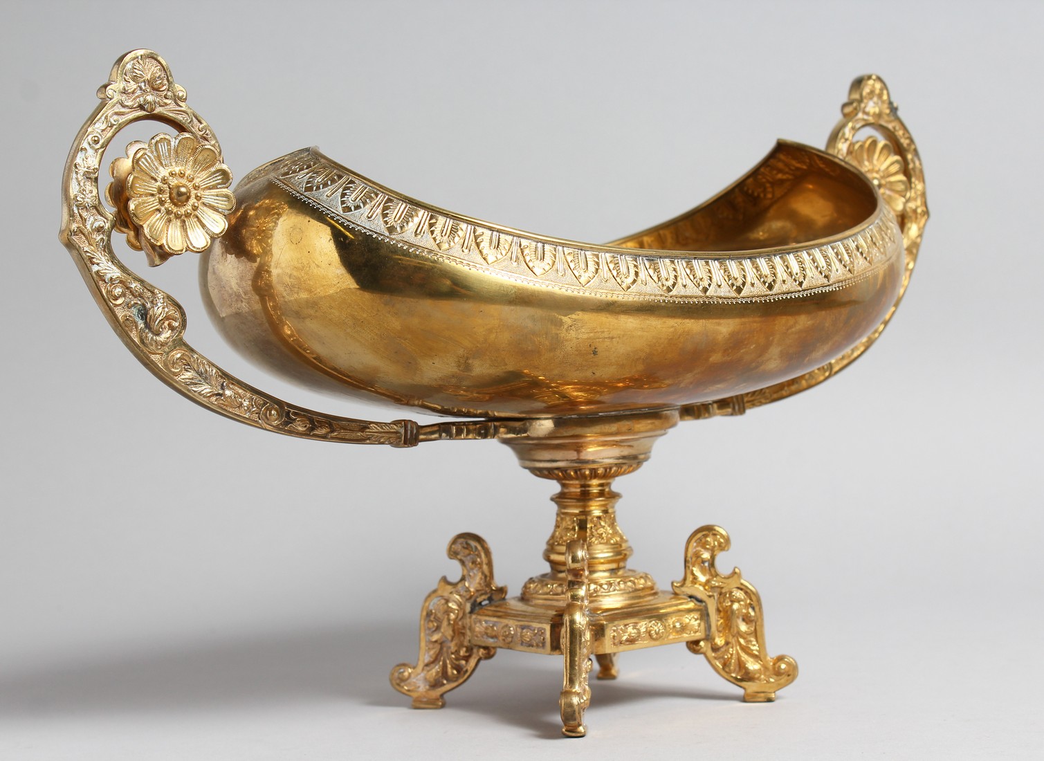 A DECORATIVE CLASSICAL STYLE GILT BRONZE TWIN HANDLED PEDESTAL OVAL SHAPE BOWL. 15.5ins high. - Image 4 of 4