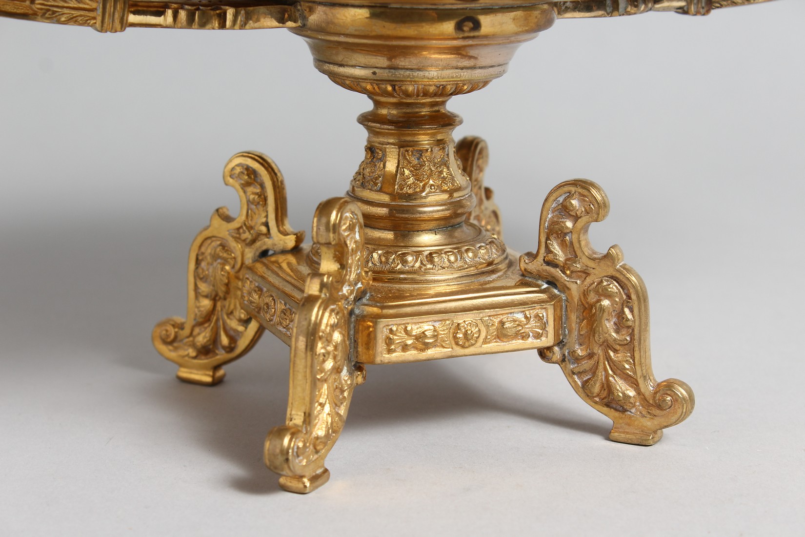 A DECORATIVE CLASSICAL STYLE GILT BRONZE TWIN HANDLED PEDESTAL OVAL SHAPE BOWL. 15.5ins high. - Image 2 of 4