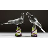 A PAIR OF LALIQUE GLASS BIRDS on colourful square bases Etched Lalique, France 8ins high.