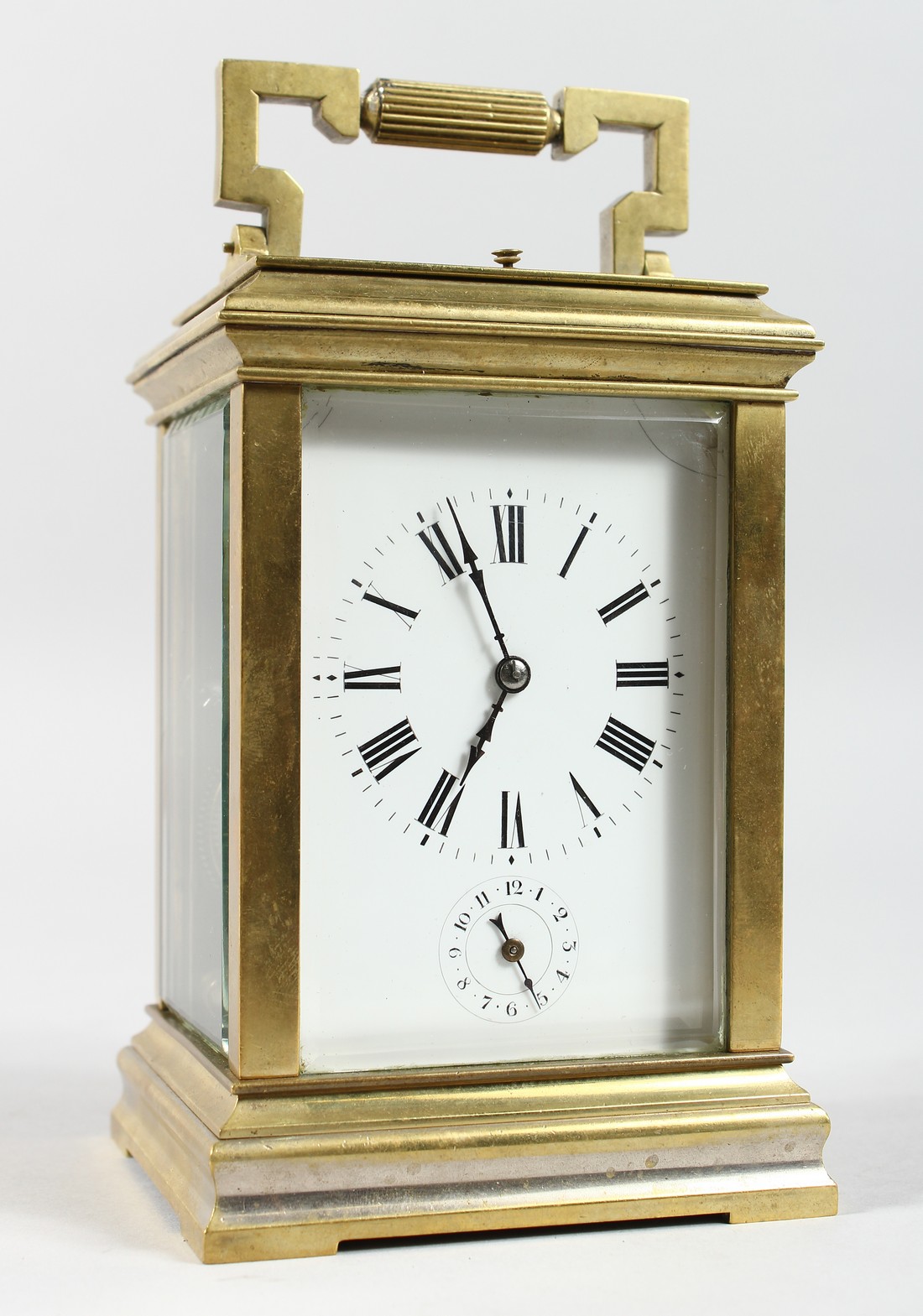 A GOOD BRASS CARRIAGE CLOCK with repeat action. 6ins high.