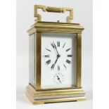 A GOOD BRASS CARRIAGE CLOCK with repeat action. 6ins high.