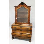 AN 18TH CENTURY DUTCH WALNUT AND MARQUETRY CABINET ON CHEST with a shaped cornice above a single