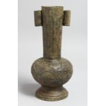 A CHINESE BRONZE ARCHAIC STYLE "ARROW" VASE. 11ins high.