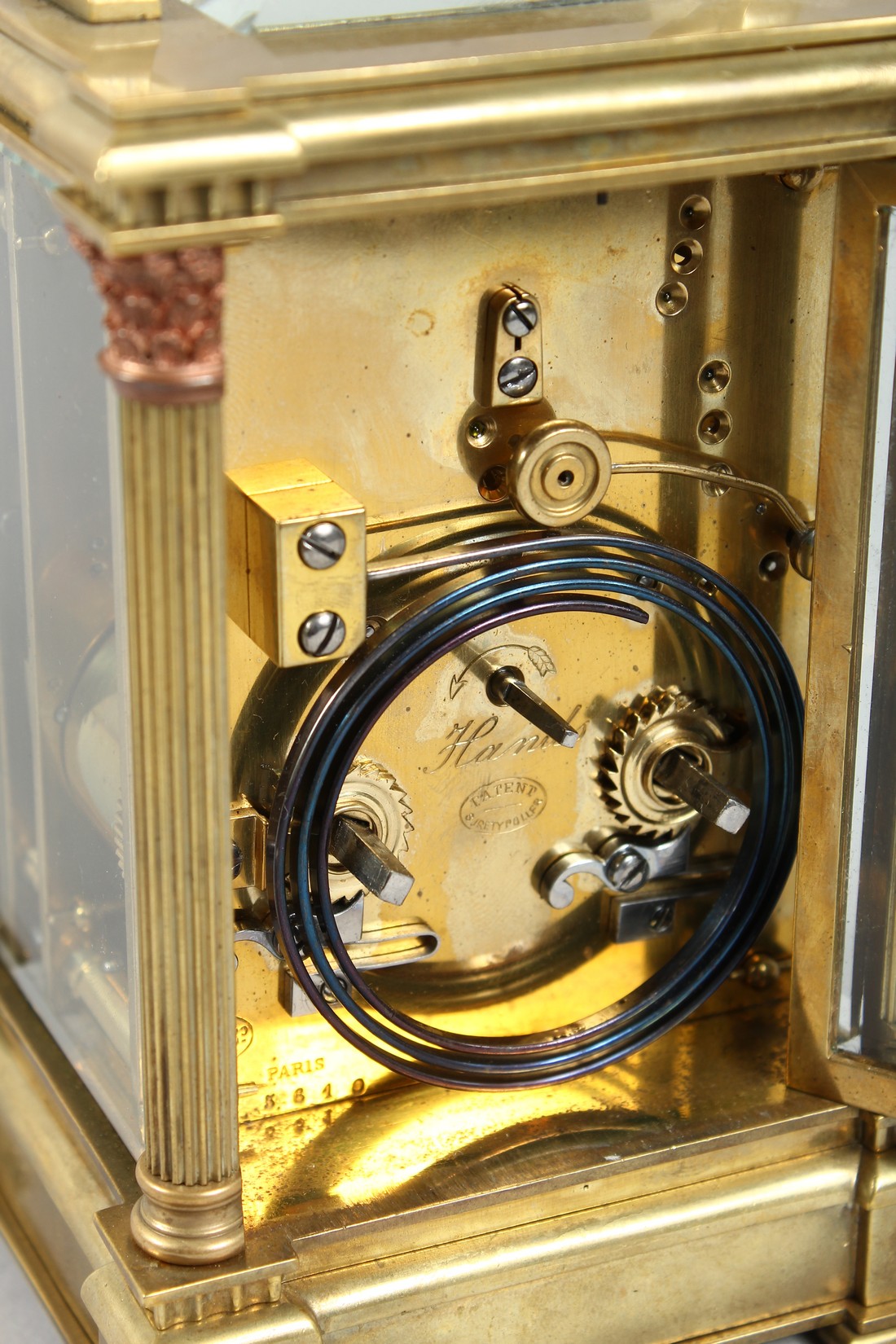 A GOOD GOLDSMITHS & SILVERSMITHS BRASS CARRIAGE CLOCK with repeat action and column supports. 6ins - Image 6 of 9