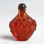 A CHINESE AMBER STYLE SNUFF BOTTLE, 3ins high.