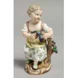 A 19TH CENTURY MEISSEN FIGURE OF A GIRL holding a bunch of grapes, seated on a tree stump.
