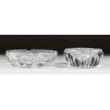 A HEAVY BACCARAT CIRCULAR GLASS ASHTRAY, 4ins diameter, and ANOTHER, 5ins diameter. (2).