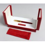 A VERY GOOD CARTIER PASHA PEN AND REFILLS in original box.