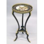 A FRENCH STYLE CIRCULAR MARQUETRY AND ORMOLU GEURIDON, inset with a porcelain bowl, painted with a