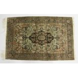 A PERSIAN SILK RUG, beige ground with all over floral decoration. 5ft 6ins x 3ft 8ins