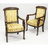 A GOOD PAIR OF FRENCH EMPIRE MAHOGANY OPEN ARMCHAIRS with reeded curving and cresting rails,