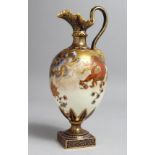 A GOOD CROWN DERBY EWER SHAPED JUG with rich blue and gilt decoration, No. 2553 over 350. 10.5ins