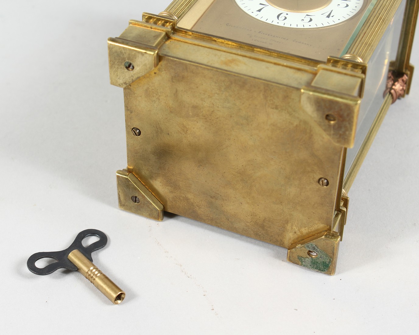 A GOOD GOLDSMITHS & SILVERSMITHS BRASS CARRIAGE CLOCK with repeat action and column supports. 6ins - Image 9 of 9