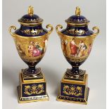 A VERY GOOD PAIR OF 19TH CENTURY VIENNA URN SHAPED VASES, COVERS AND STANDS, rich blue ground
