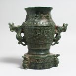 A CHINESE ARCHAIC STYLE JADEITE TWIN HANDLED VASE. 8ins high.