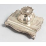 A SMALL SILVER INKSTAND with single bottle and pen well, 6.25ins long, Birmingham, 1906, with RAMC