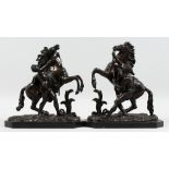 A SUPERB PAIR OF BRONZE HORSES AND ATTENDANTS on marble bases. 11ins high.