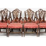 A SET OF EIGHT GEORGE III MAHOGANY DINING CHAIRS, two with arms, all with shield shaped backs,