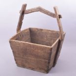 A CHINESE SQUARE FORM WOODEN GRAIN BUCKET, 54cm high.