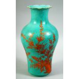 A CHINESE TURQUOISE GROUND AND CORAL RED VASE, with floral decoration in red and gilt upon incised