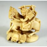 A JAPANESE CARVED IVORY NETSUKE, of a warrior on horseback, with another figure at his side and a