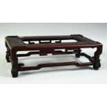 A GOOD CHINESE RECTANGULAR HARDWOOD STAND, 31.5cm x 17.5cm, 9.5cm high.