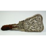 A CHINESE JADE HANDLED SILVER-METAL HAND MIRROR, the handle of traditional belt hook form, 8.8in